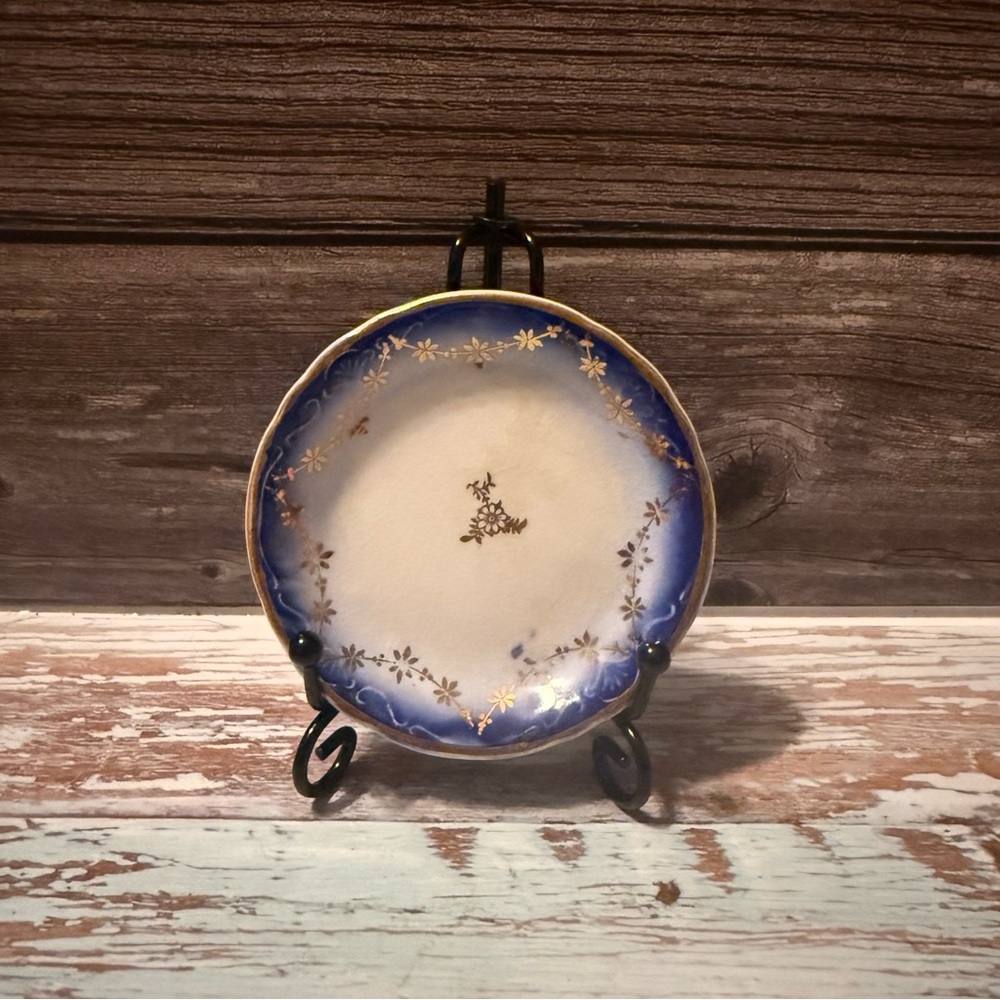 Vintage flow blue butter pat blue & gold